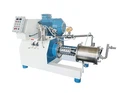 How does the material of the grinding chamber in a Dyes Pigment Bead Mill aff...